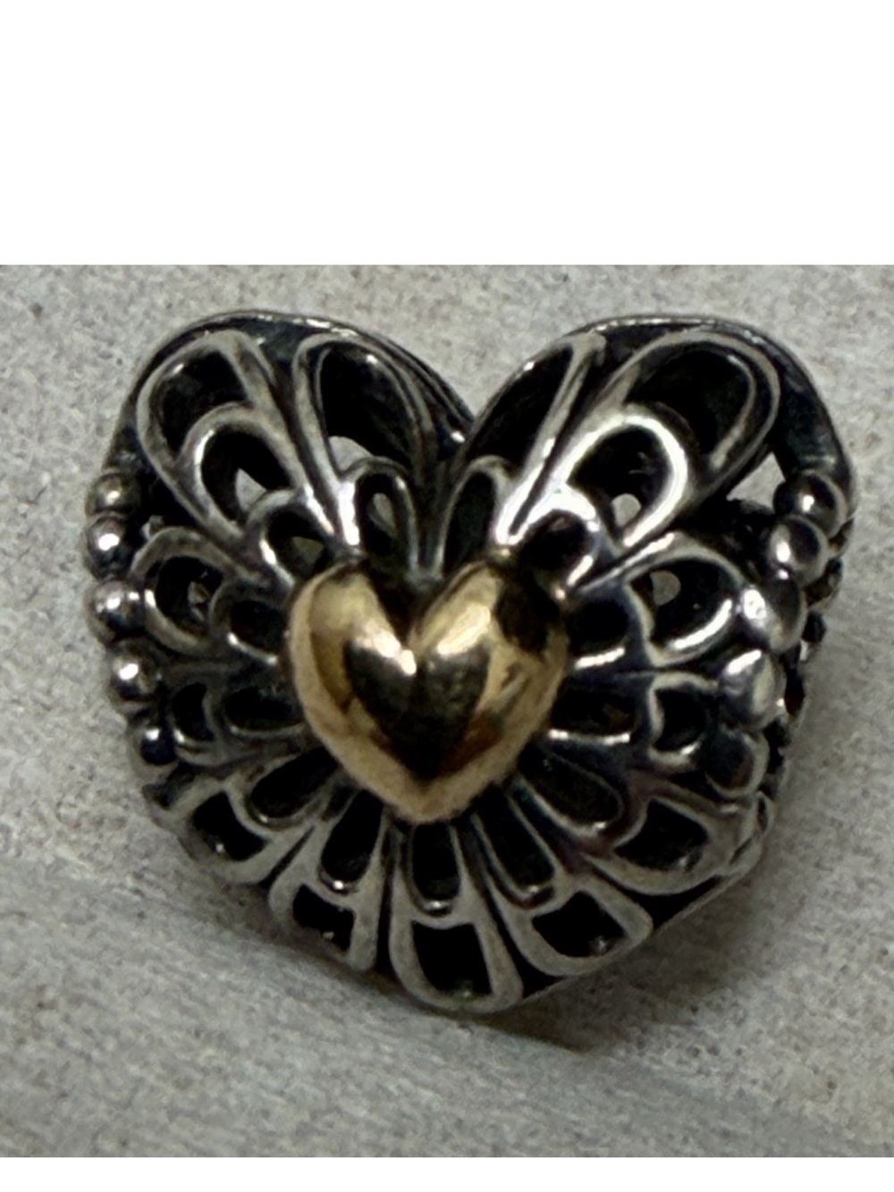 Authentic Pandora two tone  heart open work charm